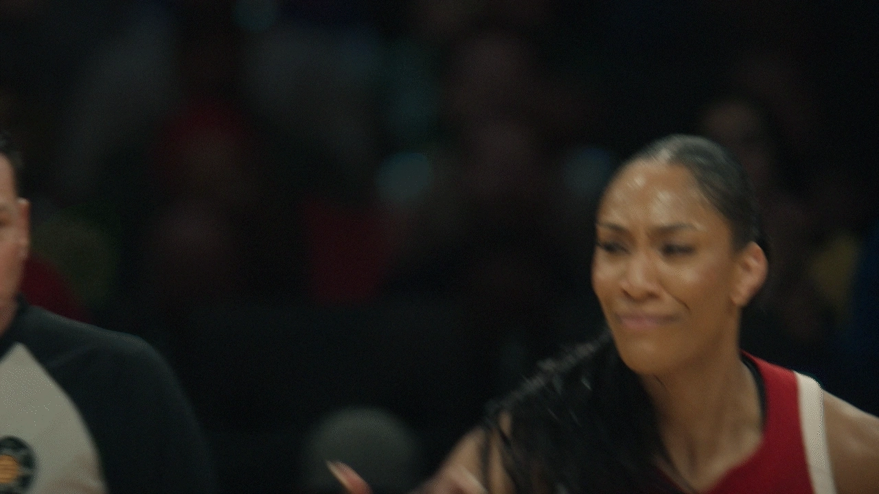 Video look of Aja Wilson saying "Nah" and shooing away a competitor on the court. She wears a red Team USA basketball jersey.