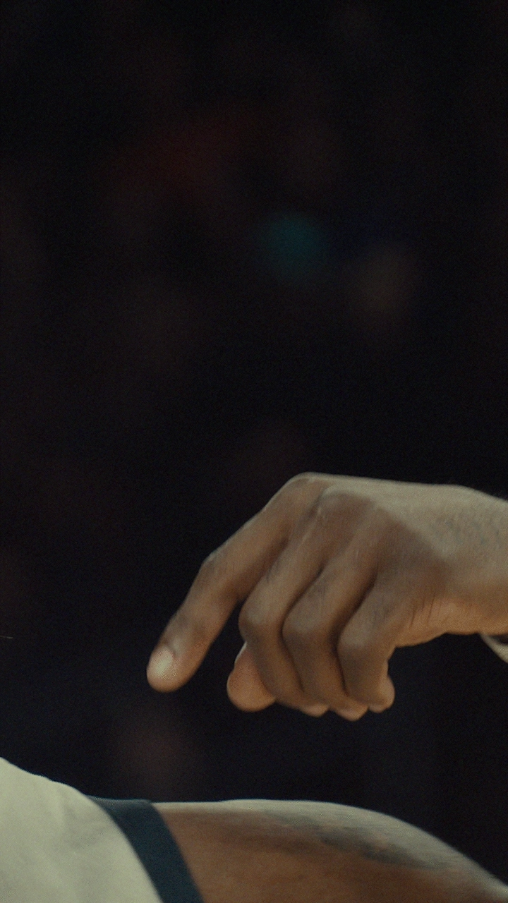 Video loop of Lebron James circling his fingers near his head, signaling "crazy" to a competitor.