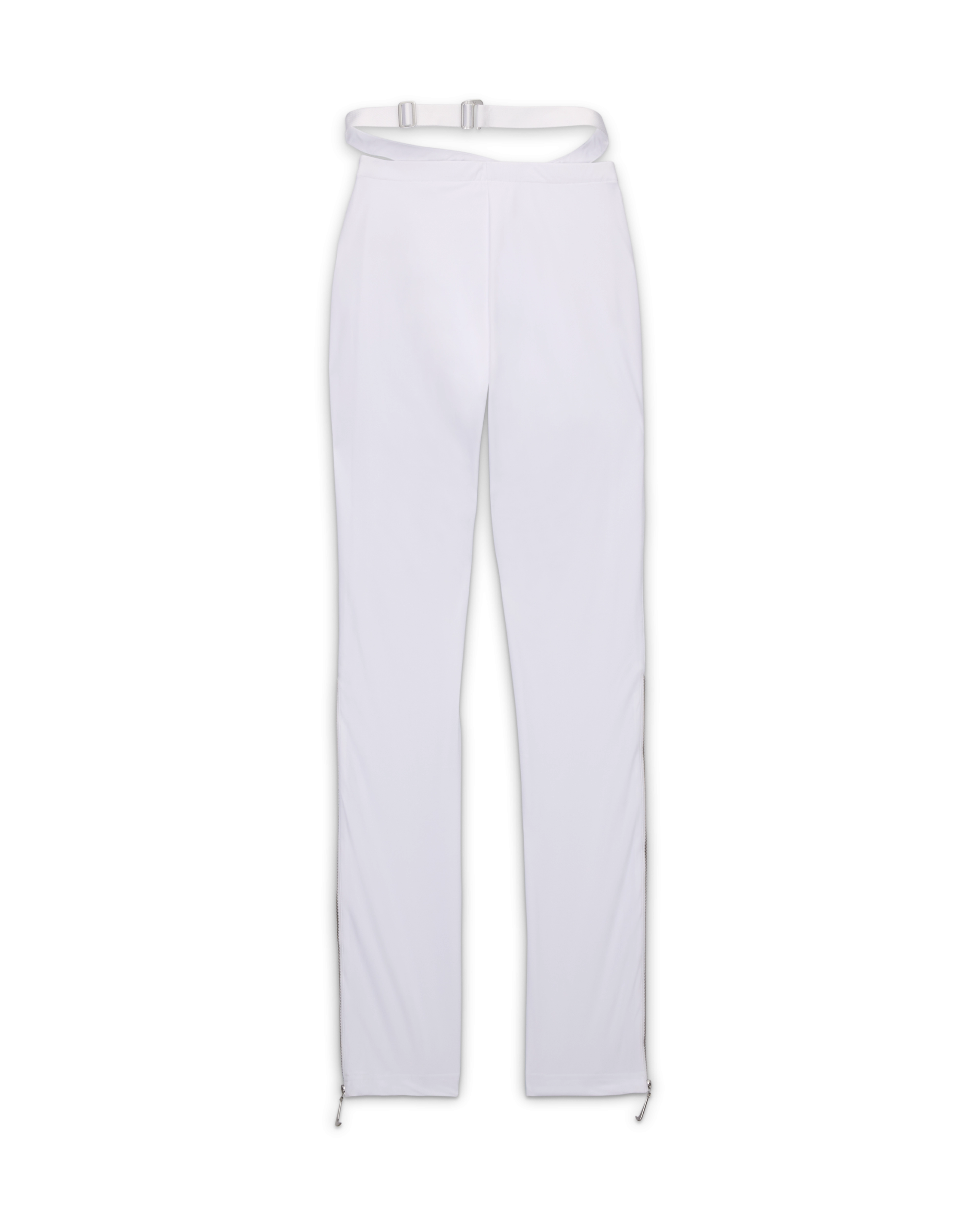 Overhead view of the Nike x Jacquemus Women's Pant in white. These form-fitting, stretchy pants includes zippers from the knee down, which have a silver zipper pull in the shape of a Swoosh. The strappy waistband is attached but separated from the waistband. The pant floats on a black background.