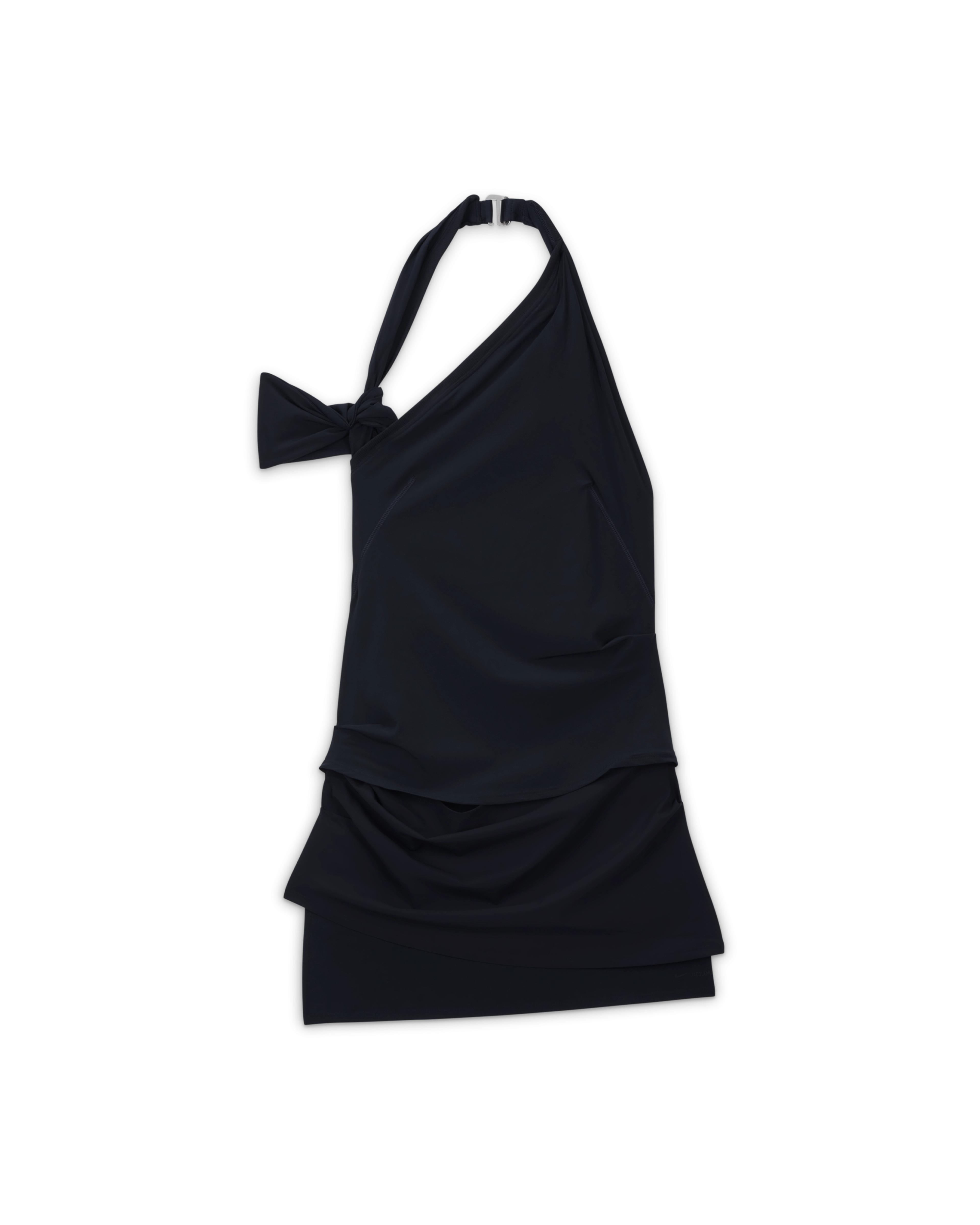 Overhead view of the Nike x Jacquemus Women's Layered Dress in dark obsidian. The form fitting, stretch dress hits at mid to upper thigh, and is sleeveless. There is a strap that attaches at the back of the neck with a silver closure and an arm band that fits over the upper arm. The dress floats on a black background.