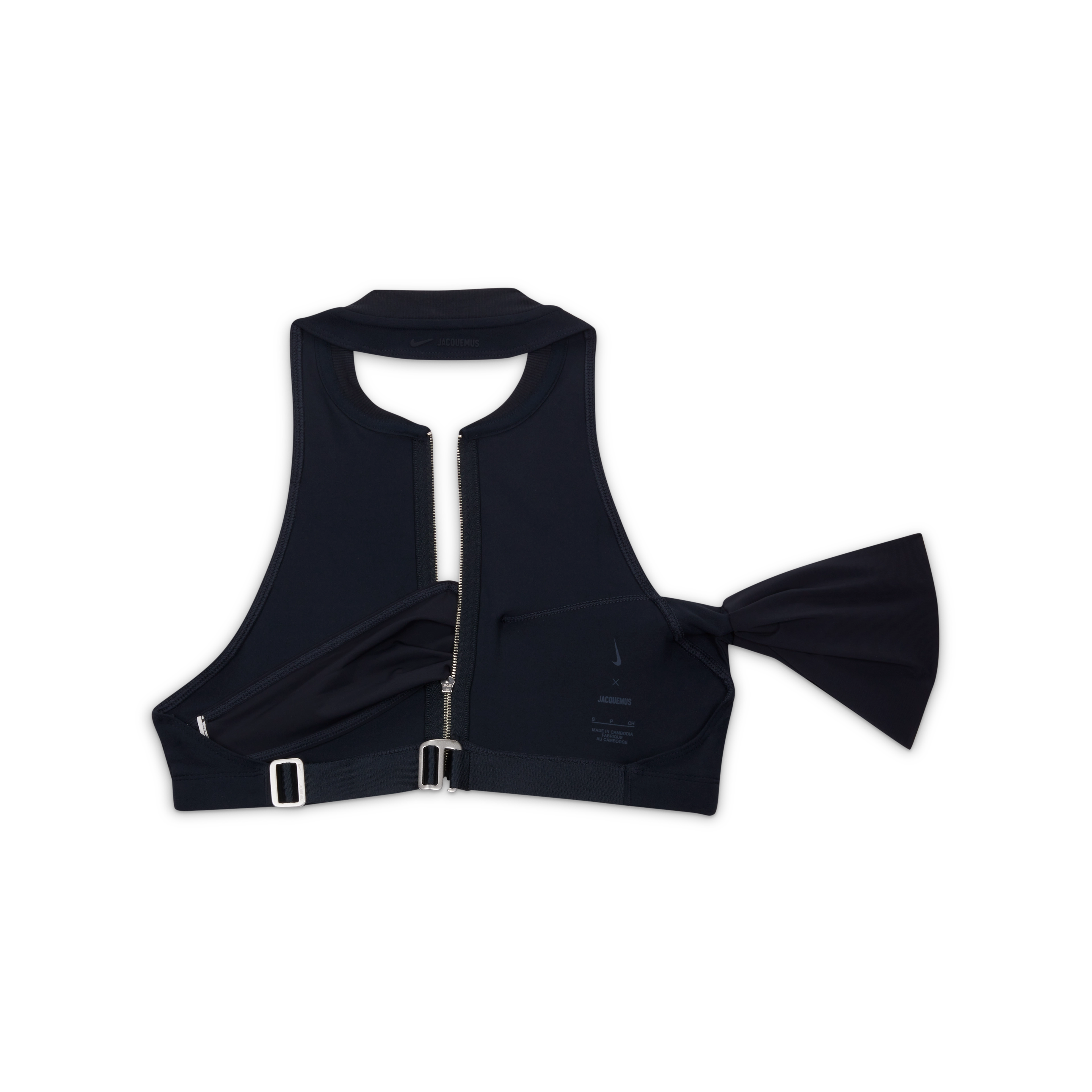 Back overhead view of the Nike x Jacquemus Halter Neck Sleeveless Crop Top in dark obsidian. We see the silver closure hardware on the back and the dark obsidian arm band material positioned to the right side. The piece floats on a black background.
