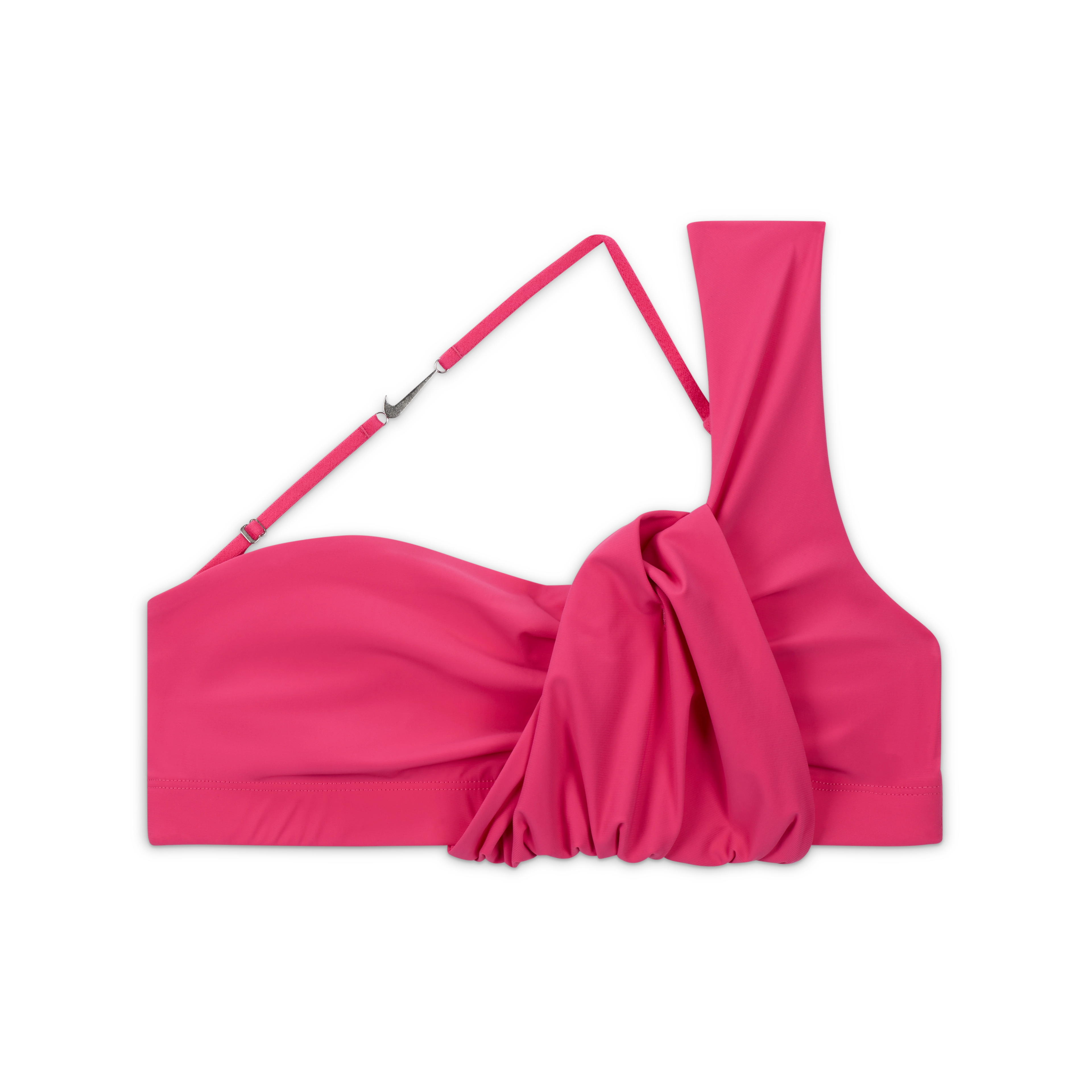 Overhead view of the Nike x Jacquemus Women's Top in watermelon pink. A layered, ruched design has one over-the-shoulder strap and one thin cross body strap with a silver Swoosh metal detail. The top floats on a black background.