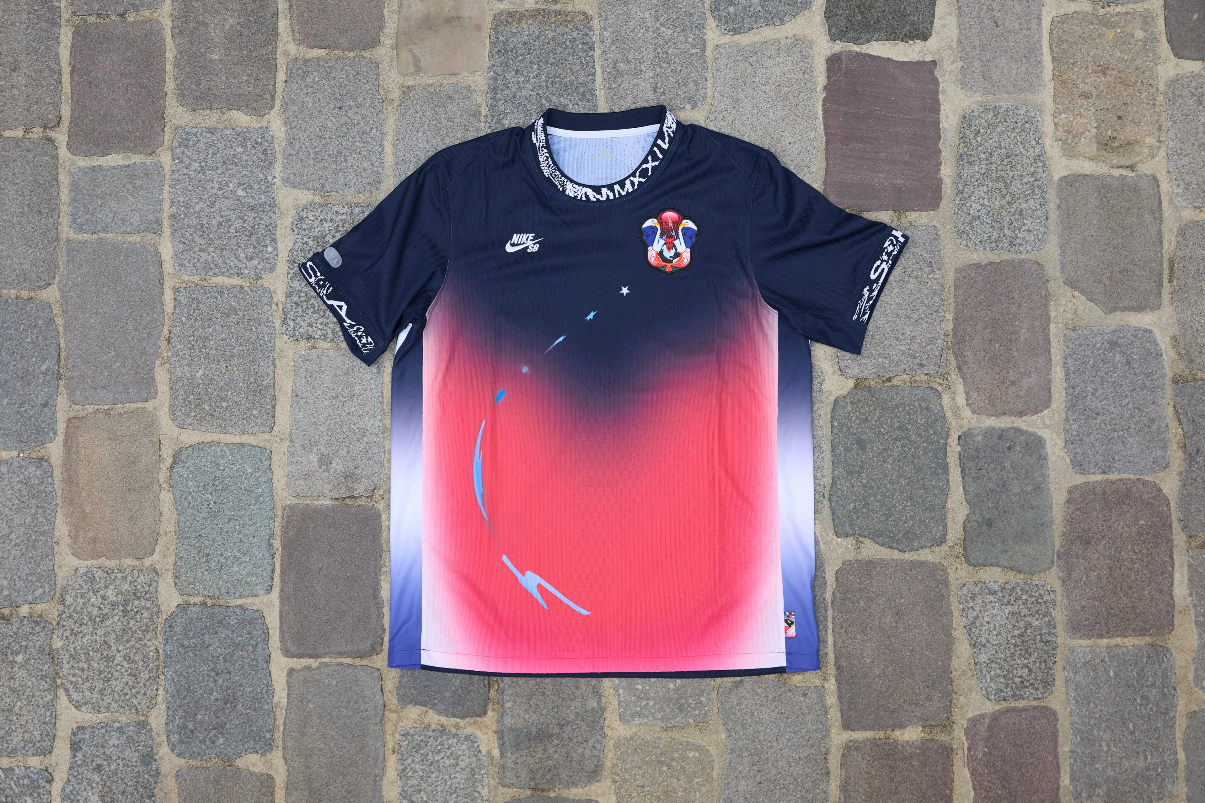 Overhead view of the USA short sleeve shirt from the skateboarding federation kit.