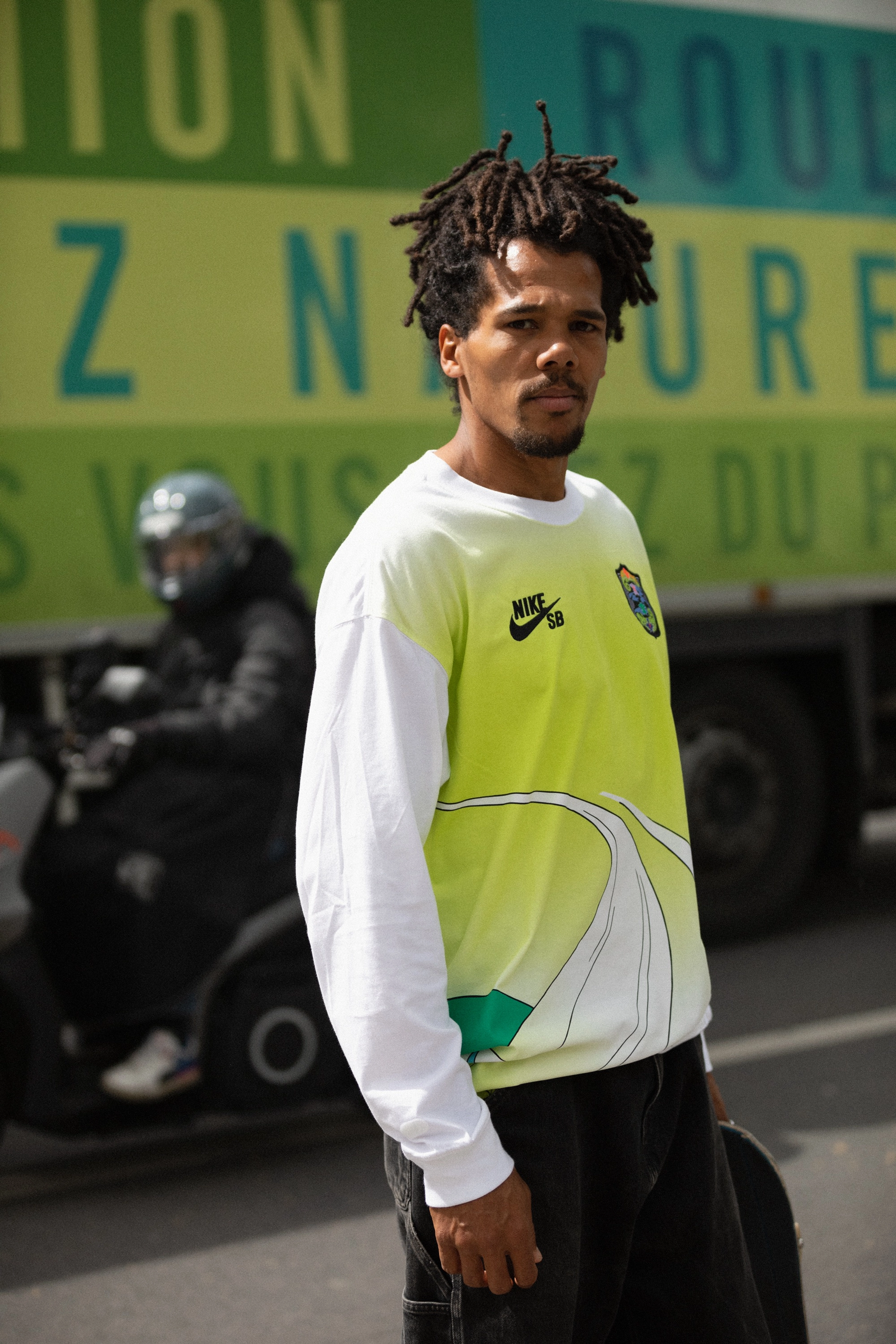 Nike SB team rider Koran Gayle wearing the lime green long sleeve shirt from the skateboarding federation kit.