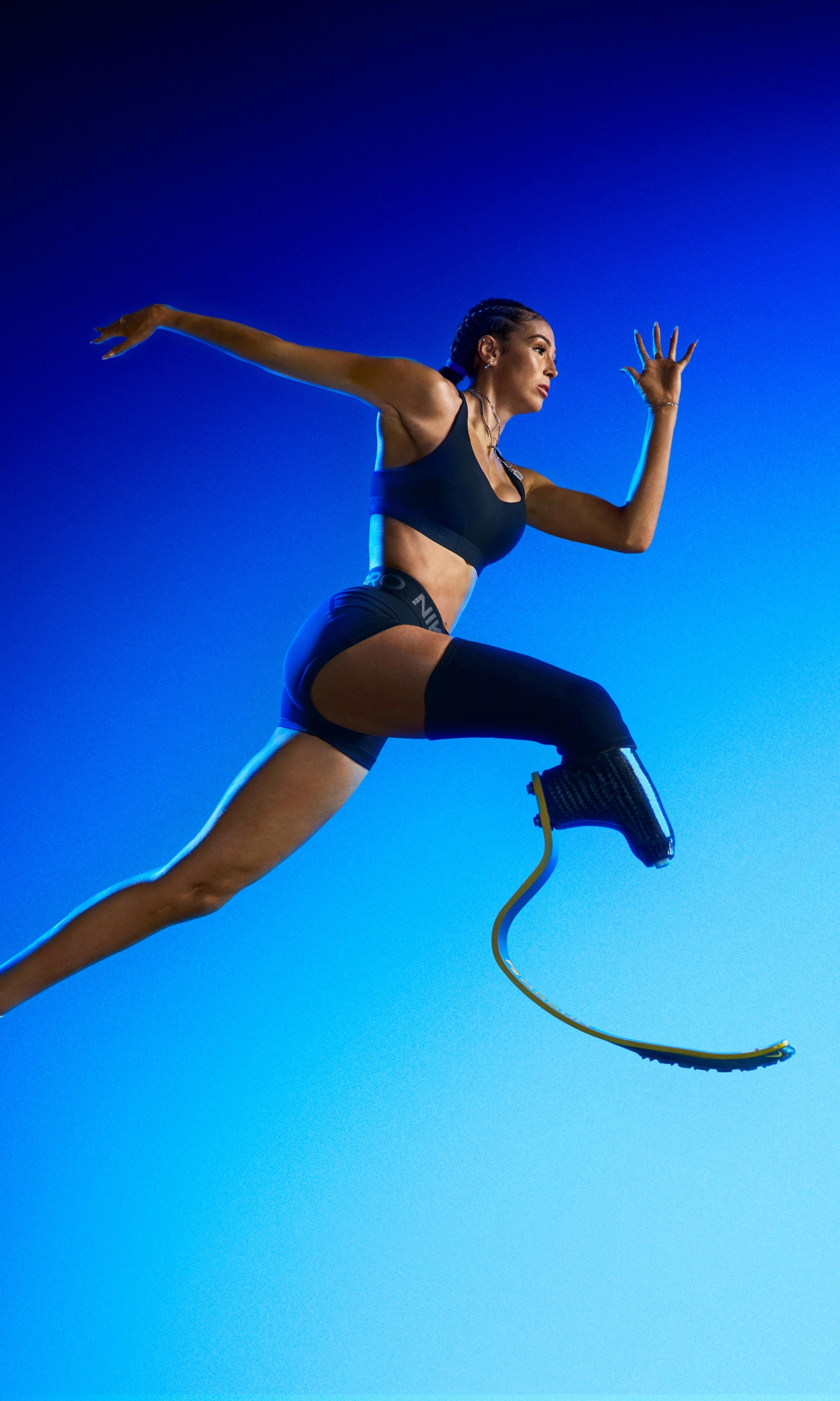 American long jumper and sprinter Beatriz Hatz in mid air jumping while wearing the Nike Pegasus EasyOn
