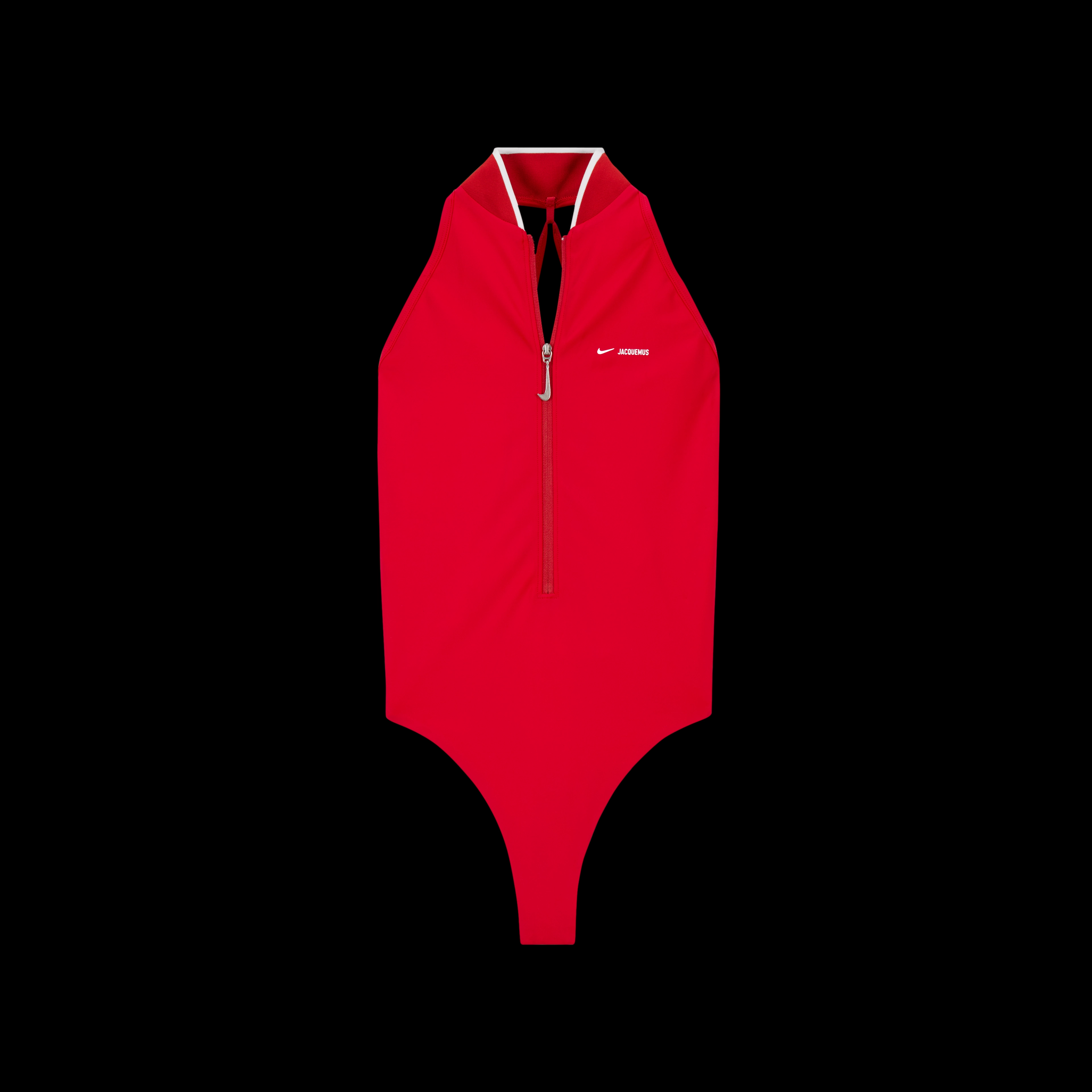 Overhead view of the Nike x Jacquemus High Neck One Piece Swimsuit in university red with white pinstripe at the collar edge. There is a zipper on the suit that runs half way up the piece, and uses a silver pull in the shape of a Nike Swoosh. The piece floats on a black background.