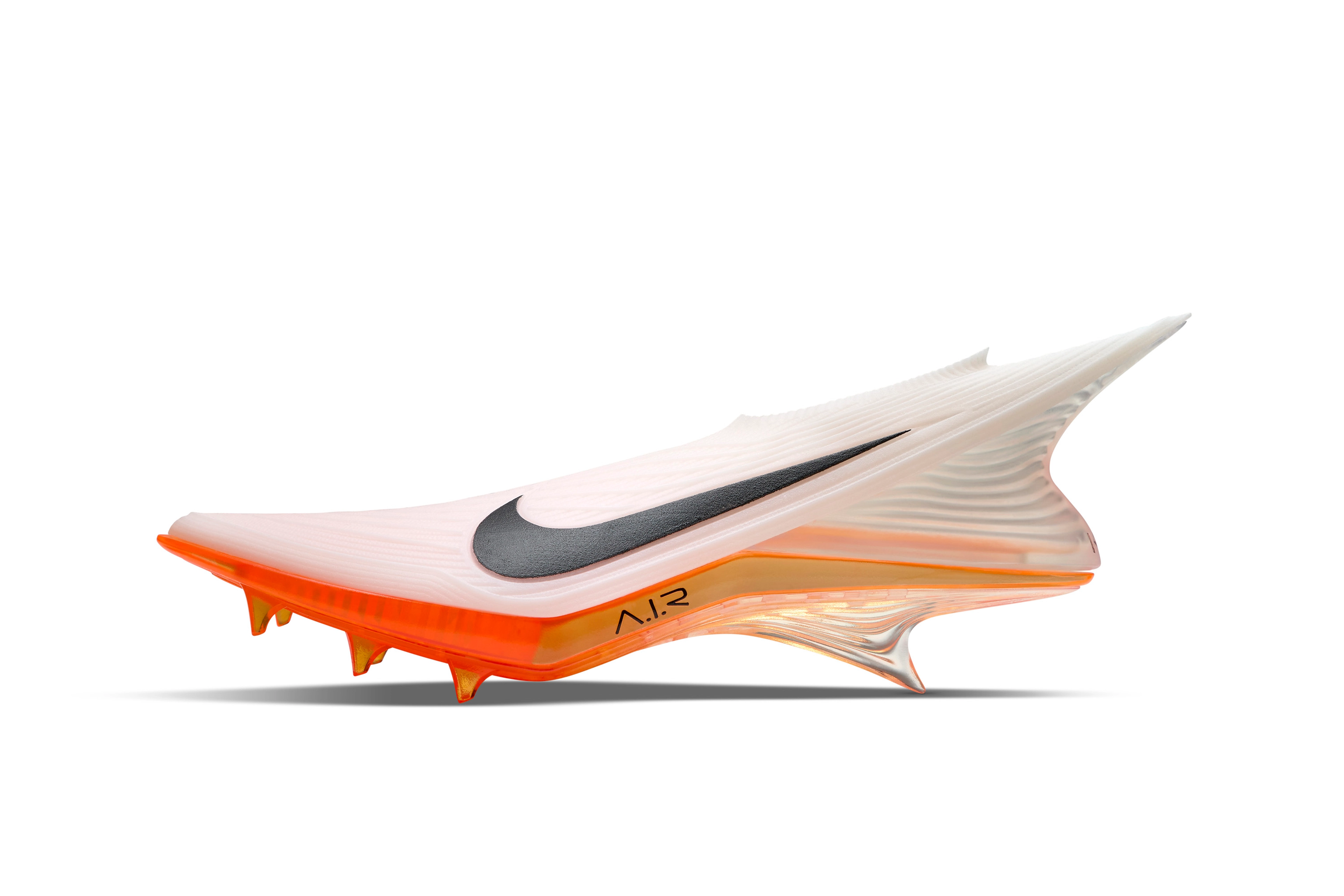 Left view of shoe concept in white for Kylian Mbappe featuring a full length air unit integrated throughout the underfoot plate, underfoot traction, and a boot profile inspired by the function of a track spike.