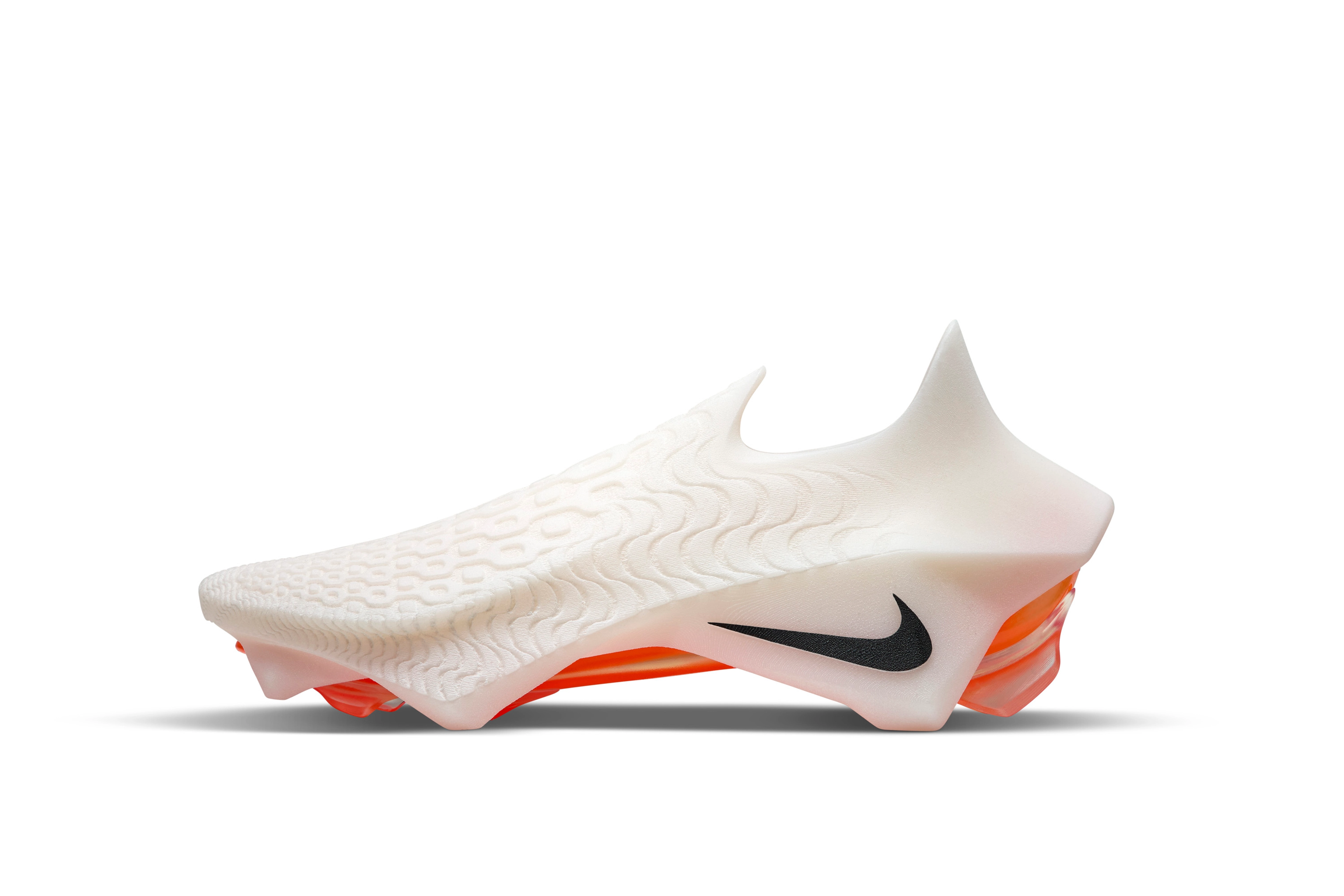 Left view of shoe concept in white for Brazilian footballer Vinicius Jr. featuring boot studs slanting outwards and an upper computational pattern that transforms down the forefoot.