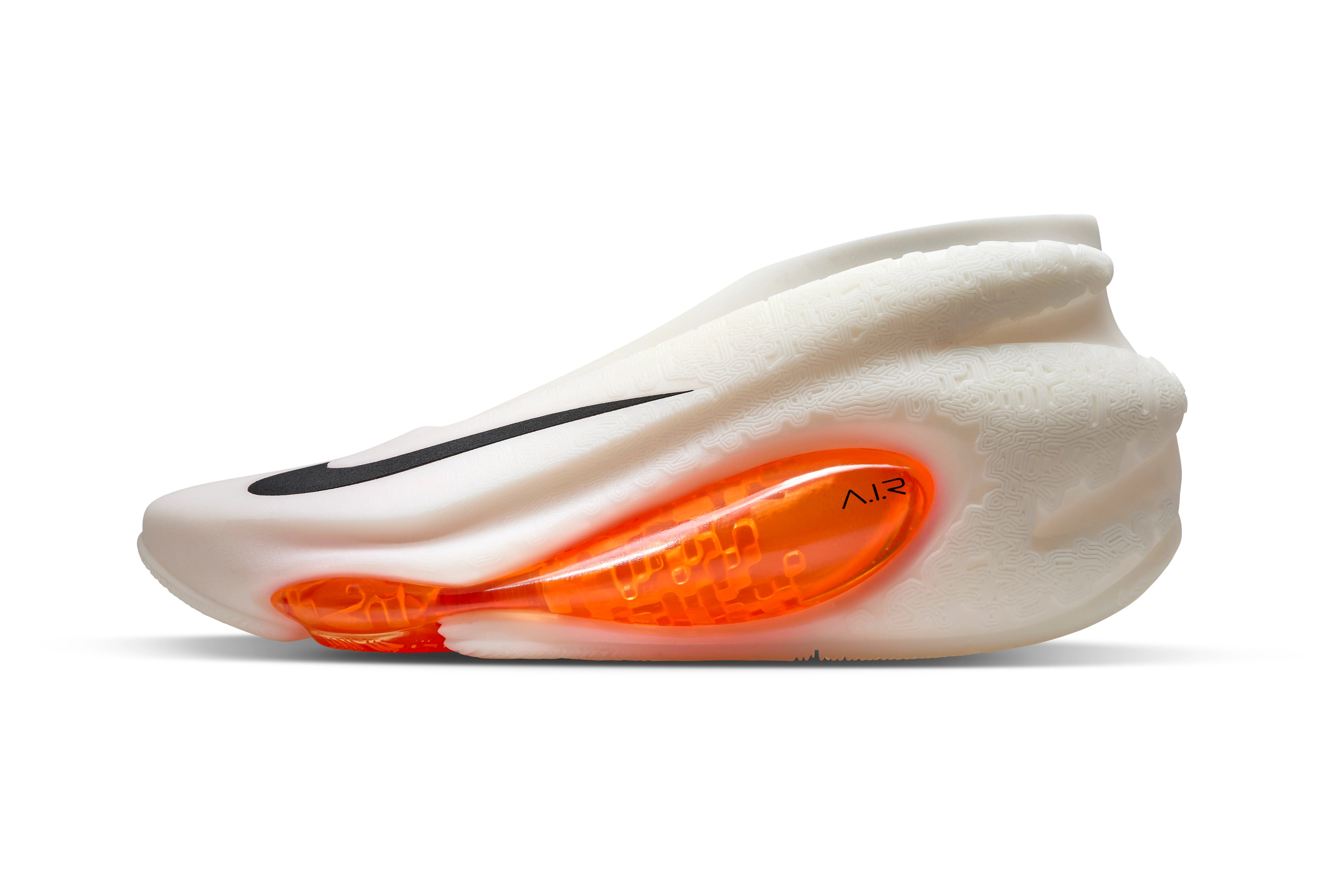 Left view of concept shoe in white for Victor Wembanyama featuring an orange air unit traveling from under the forefoot and across the shoe's lateral side with a pixelated fractal appearance.