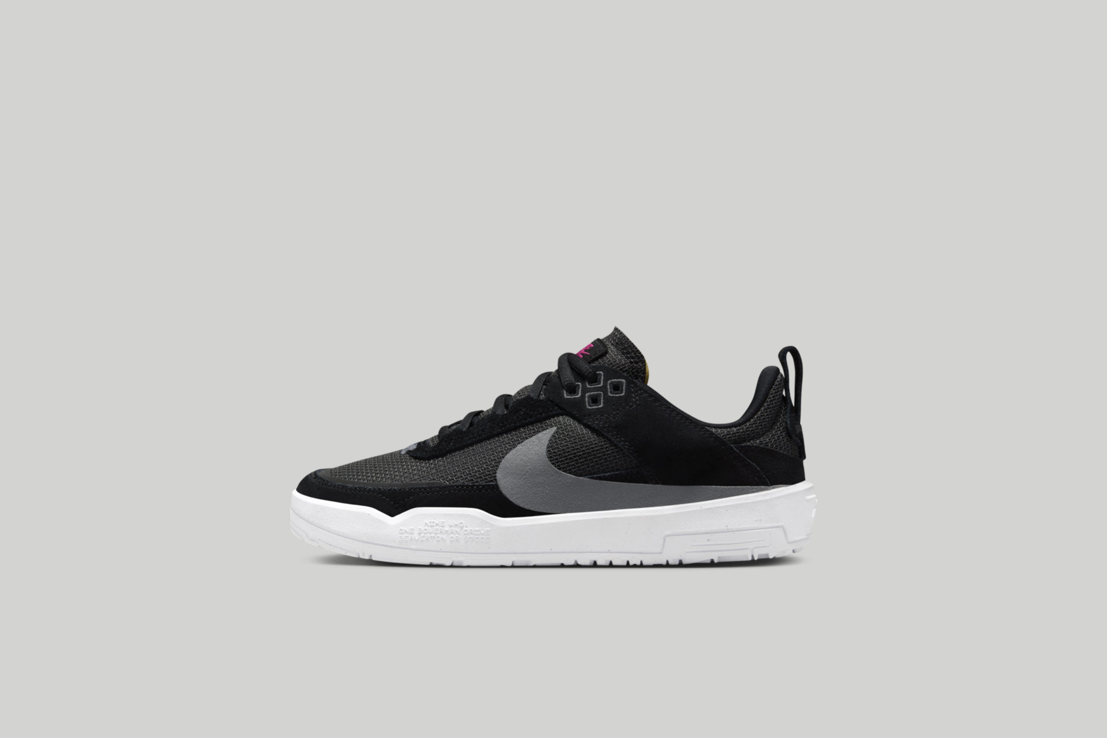 Left view of the kids Nike SB Day One in black.