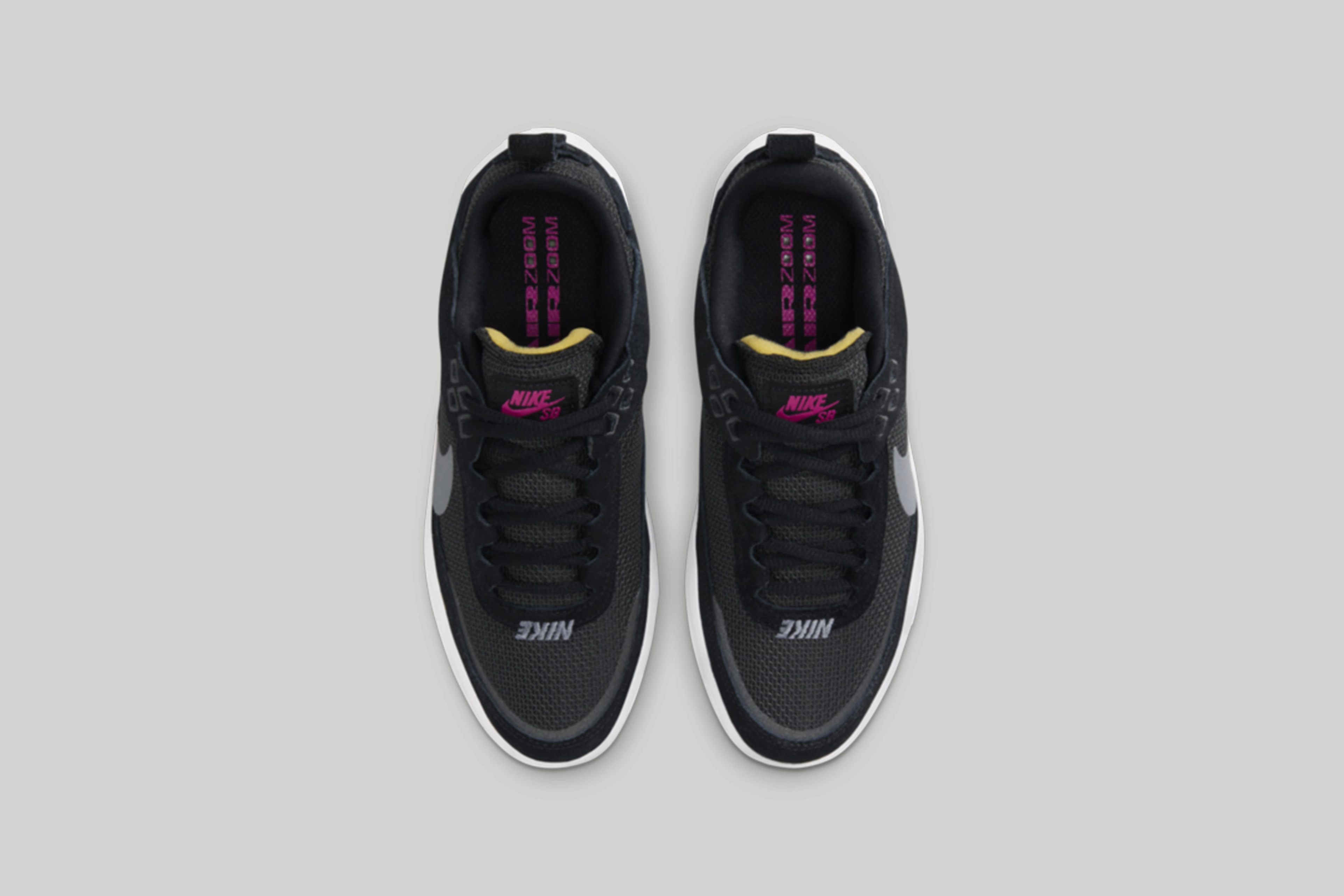 Overhead view of the kids Nike SB Day One in black.