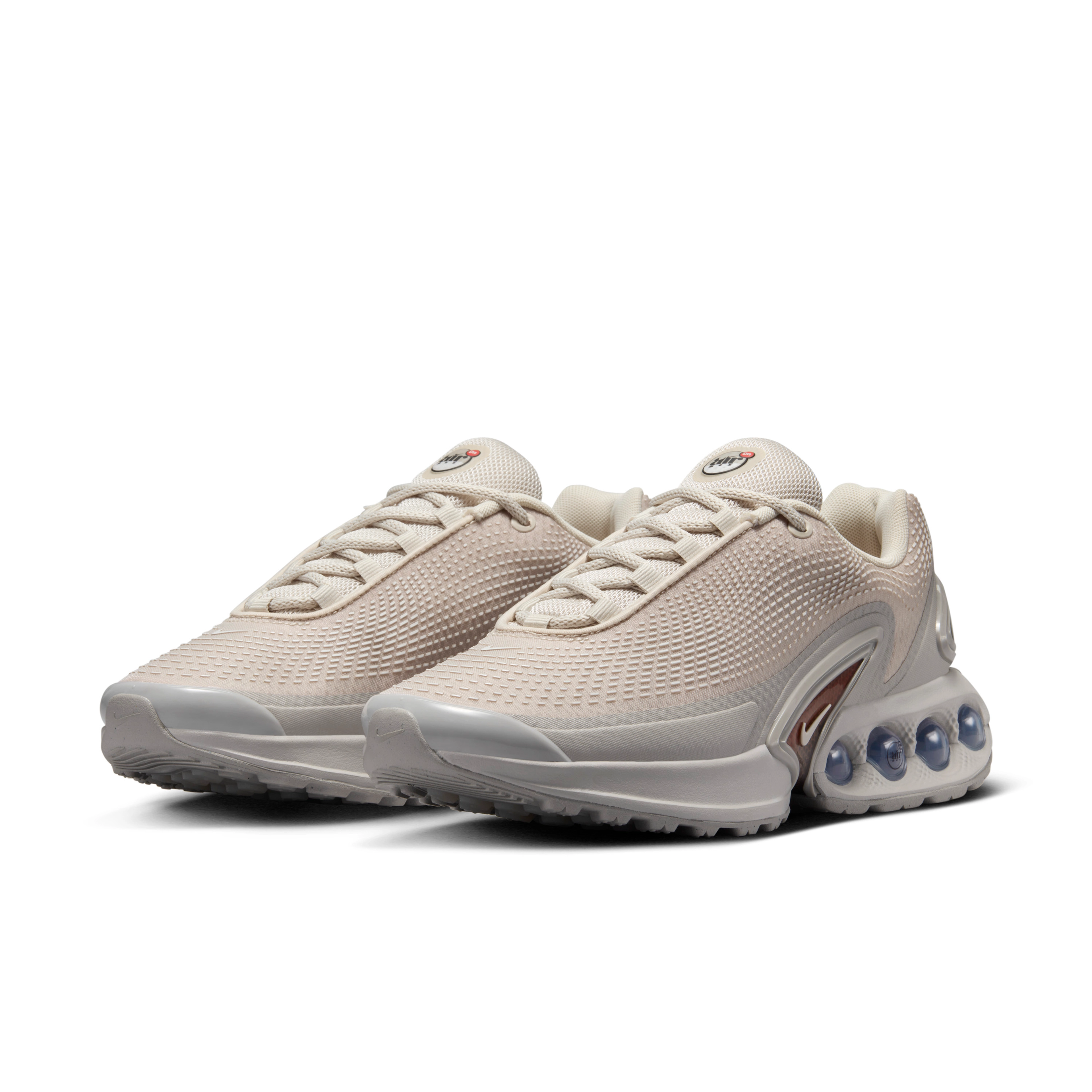 Front angled view of the women's Nike Air Max Dn in light orewood brown