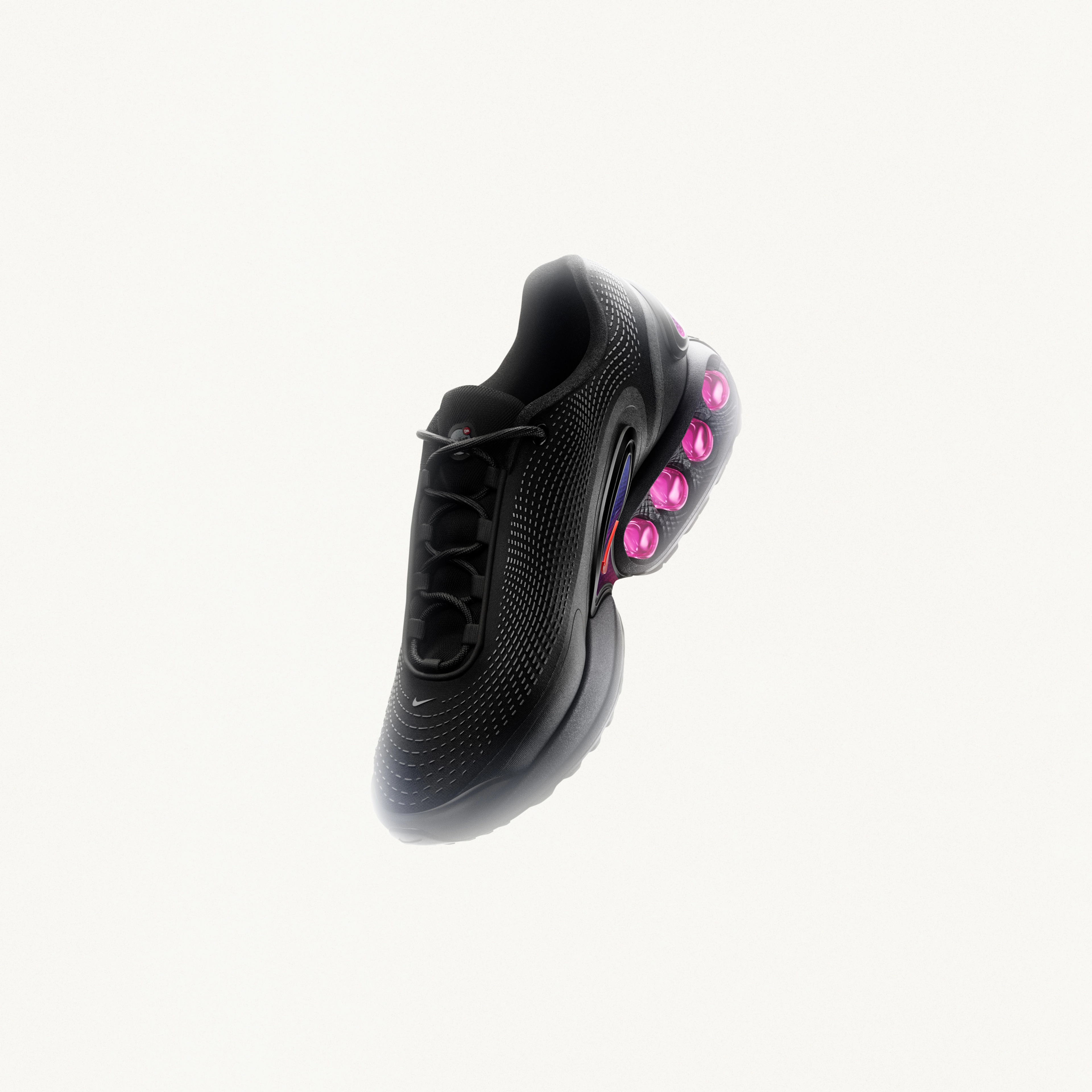 Overhead view of the Nike Air Max Dn in black featuring the upper haptic, textured overlay with a silicone finish.