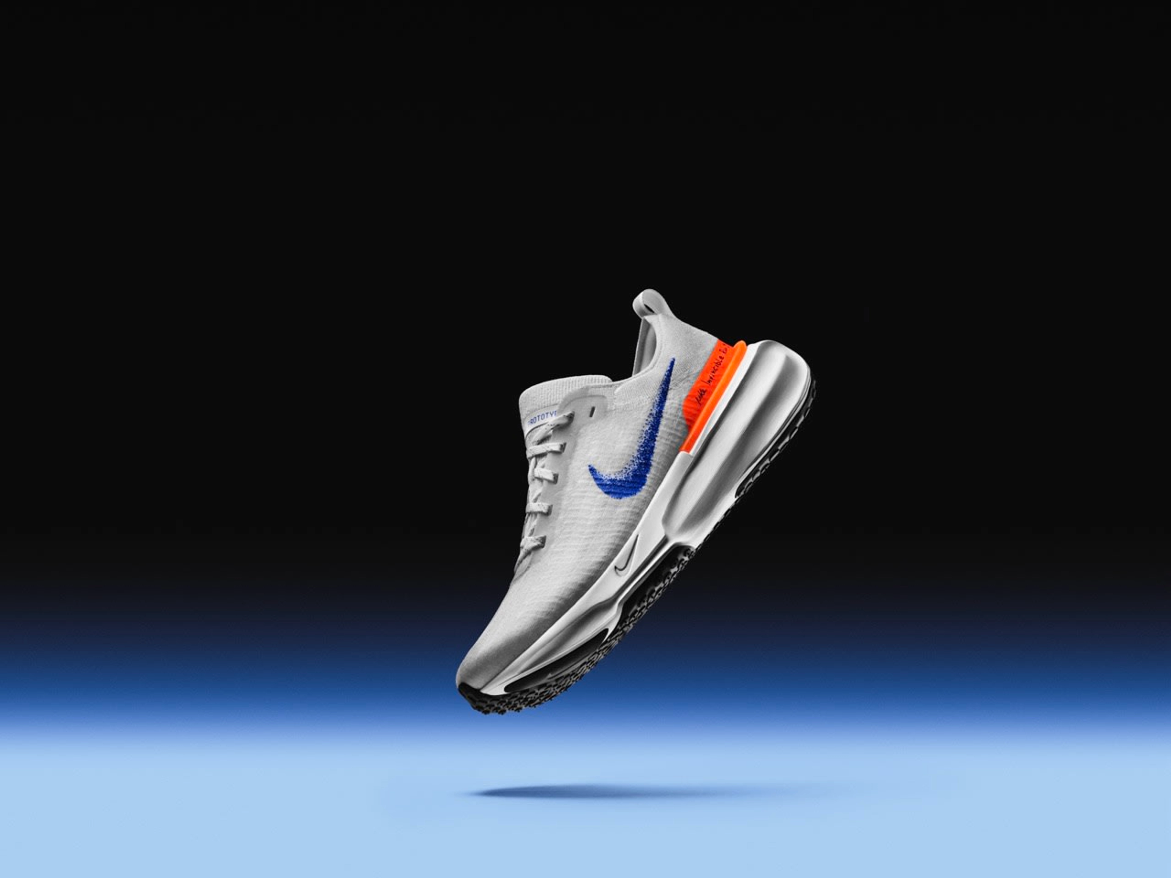 Left view of the Nike Invincible 3 in white.