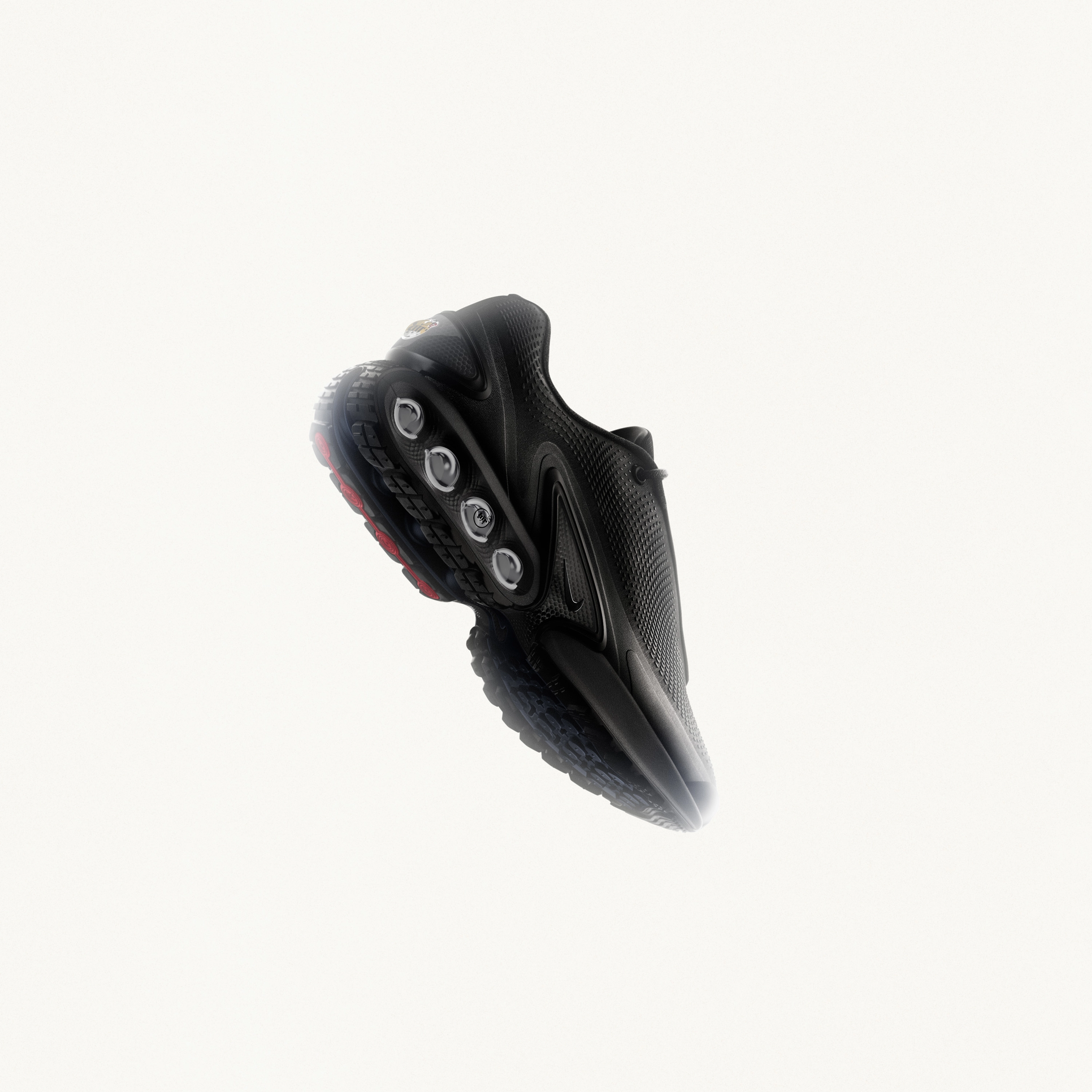 Right side view of the Nike Air Max Dn in the black colorway