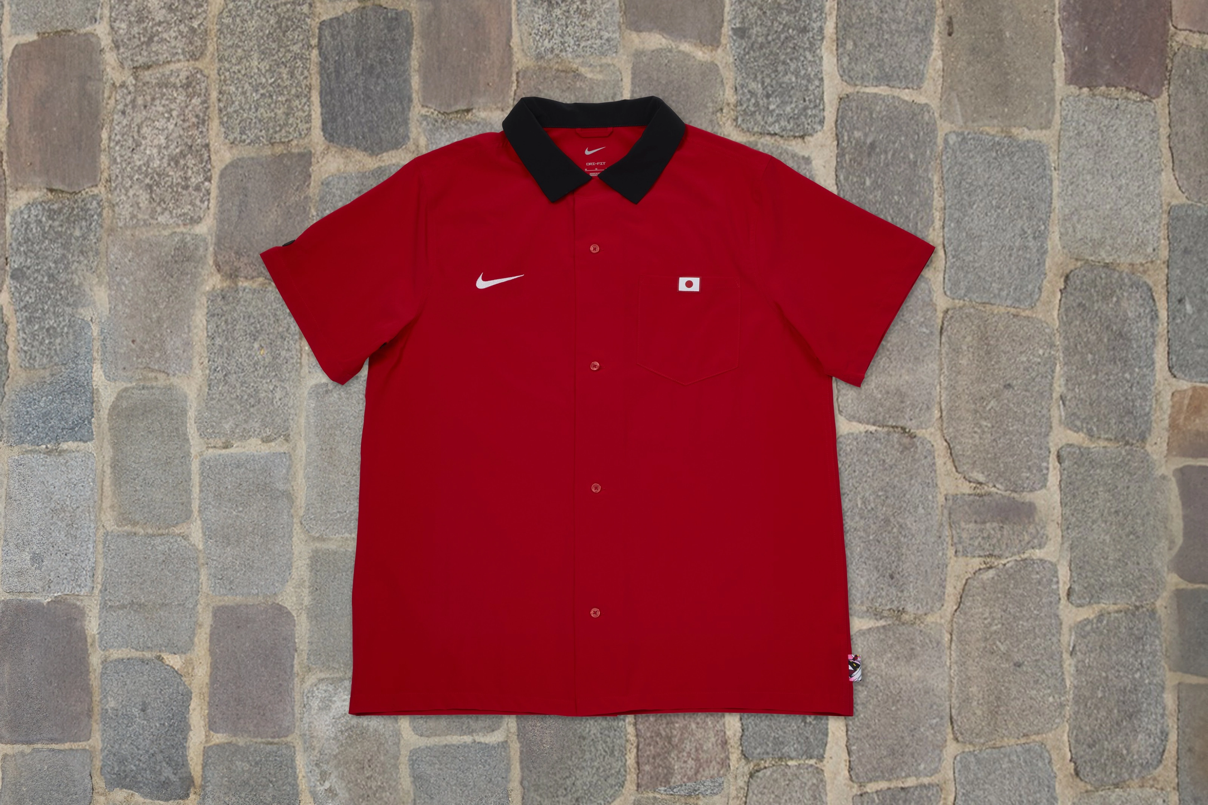 Front view of the red shirt from Japan's skateboarding federation kit.